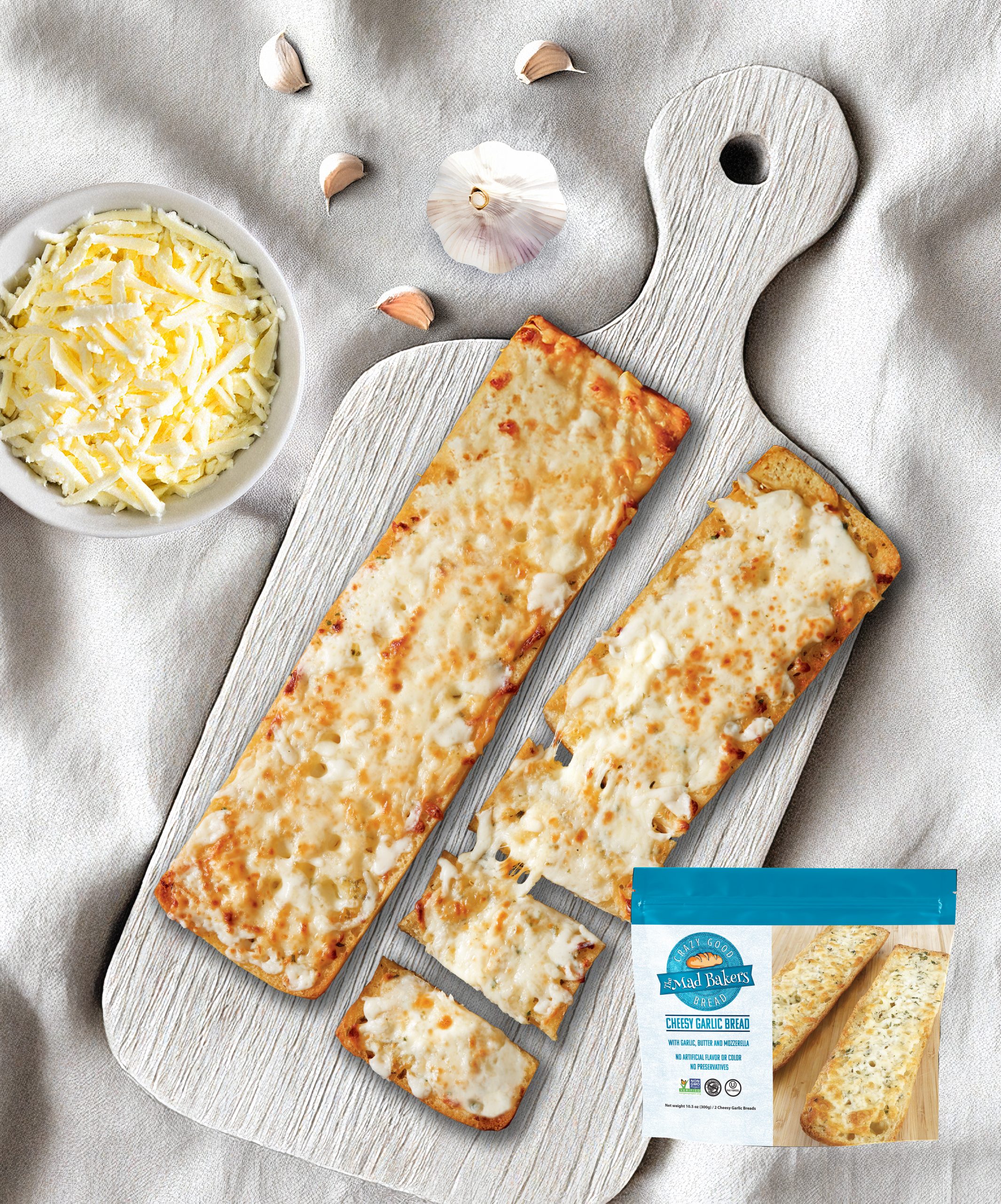 two-loaves-one-cut-on-cutting-board-2